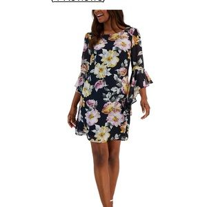 Floral navy dress sits above knee, ruffled sleeves 3/4 length, size 14